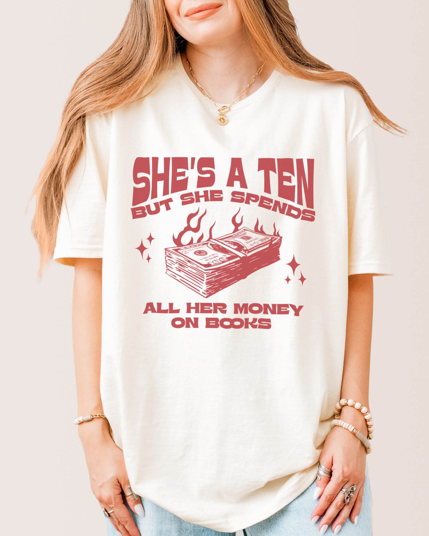 She's A Ten But She Spends All Her Money on Books T‑Shirt Natural