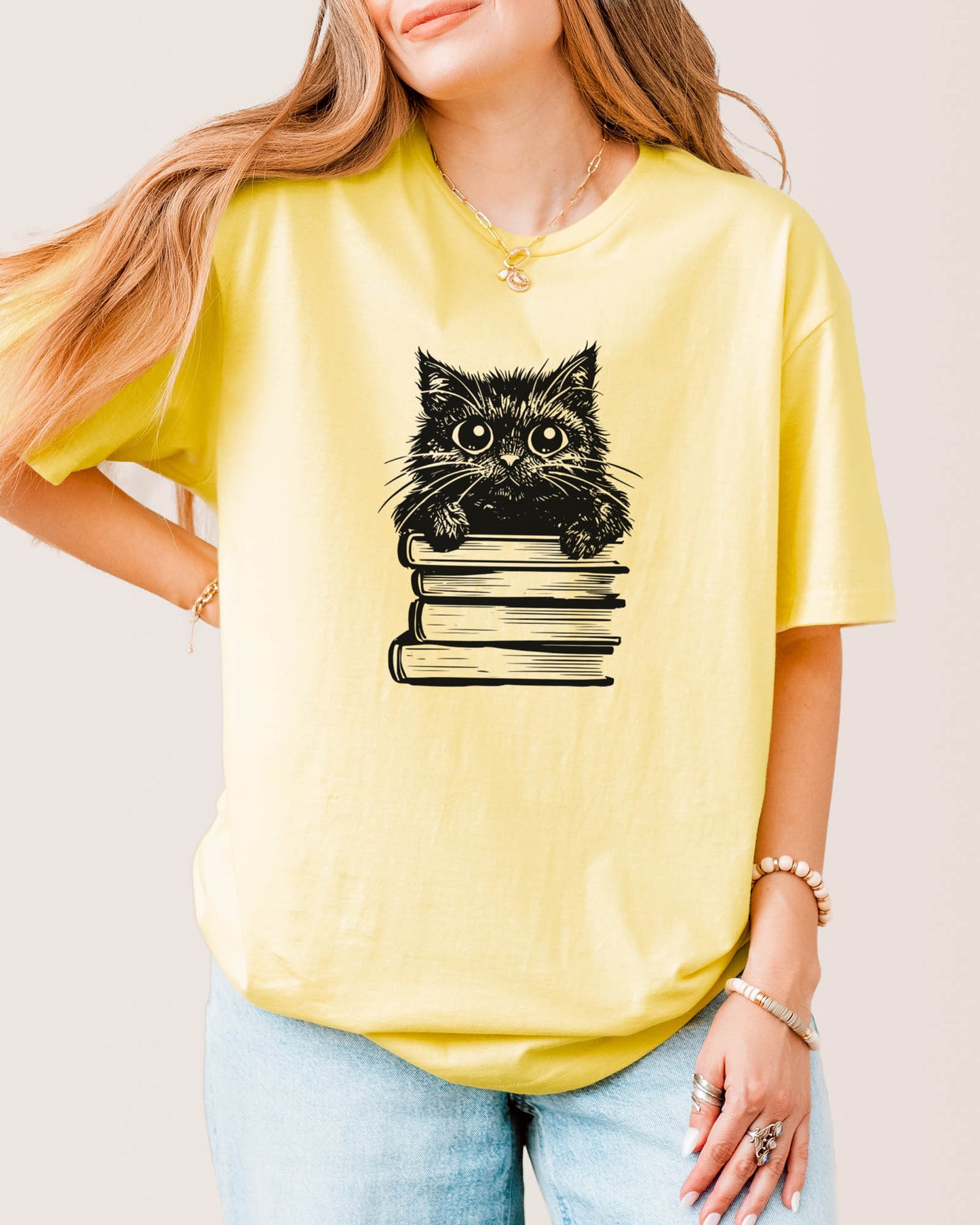 Cat On Books T‑Shirt Cornsilk