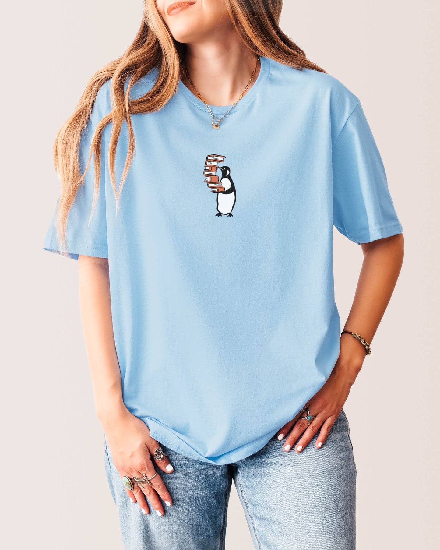 Penguin Carrying Books T‑Shirt Light Blue