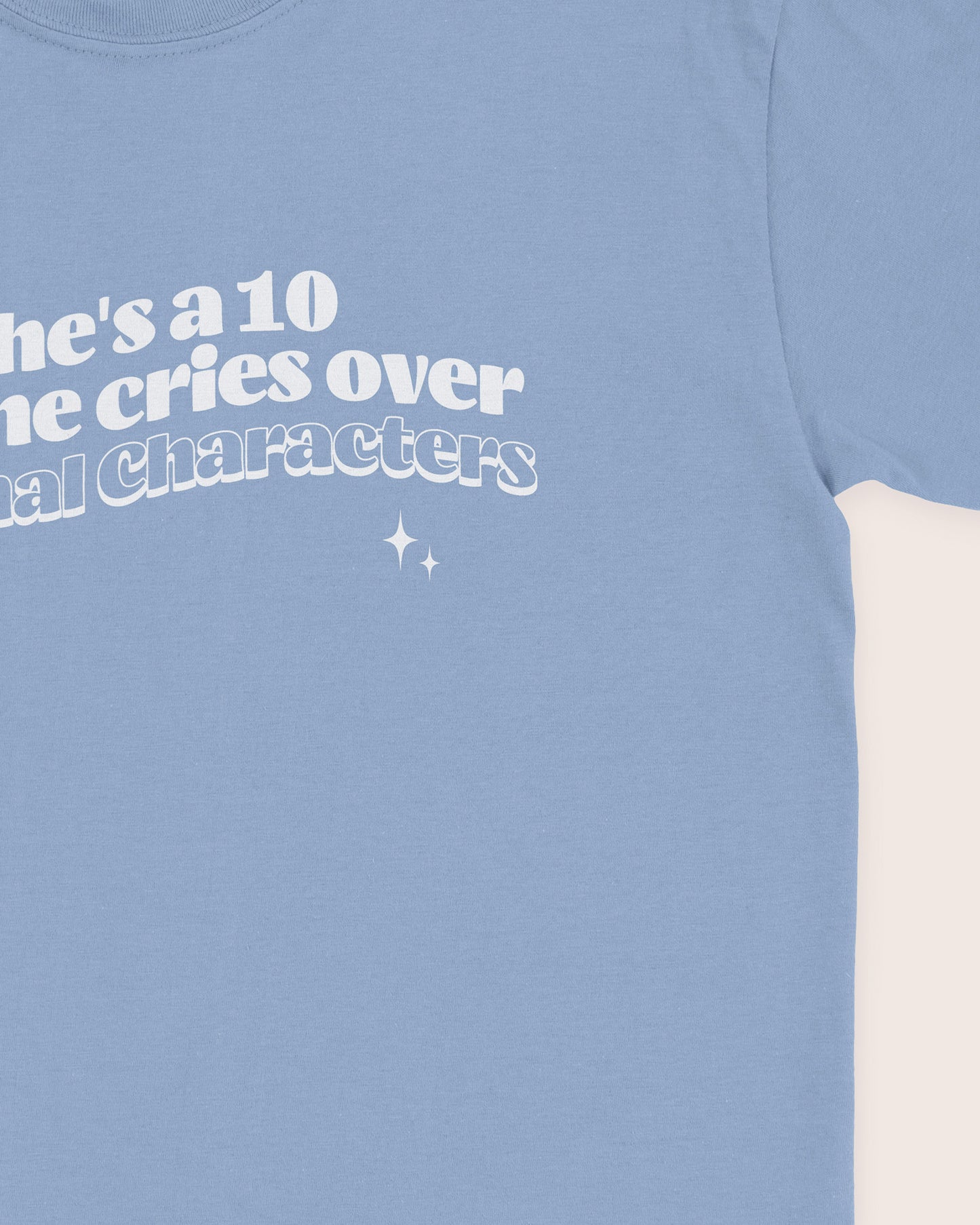 She's A 10 But She Cries Over Fictional Characters T‑Shirt