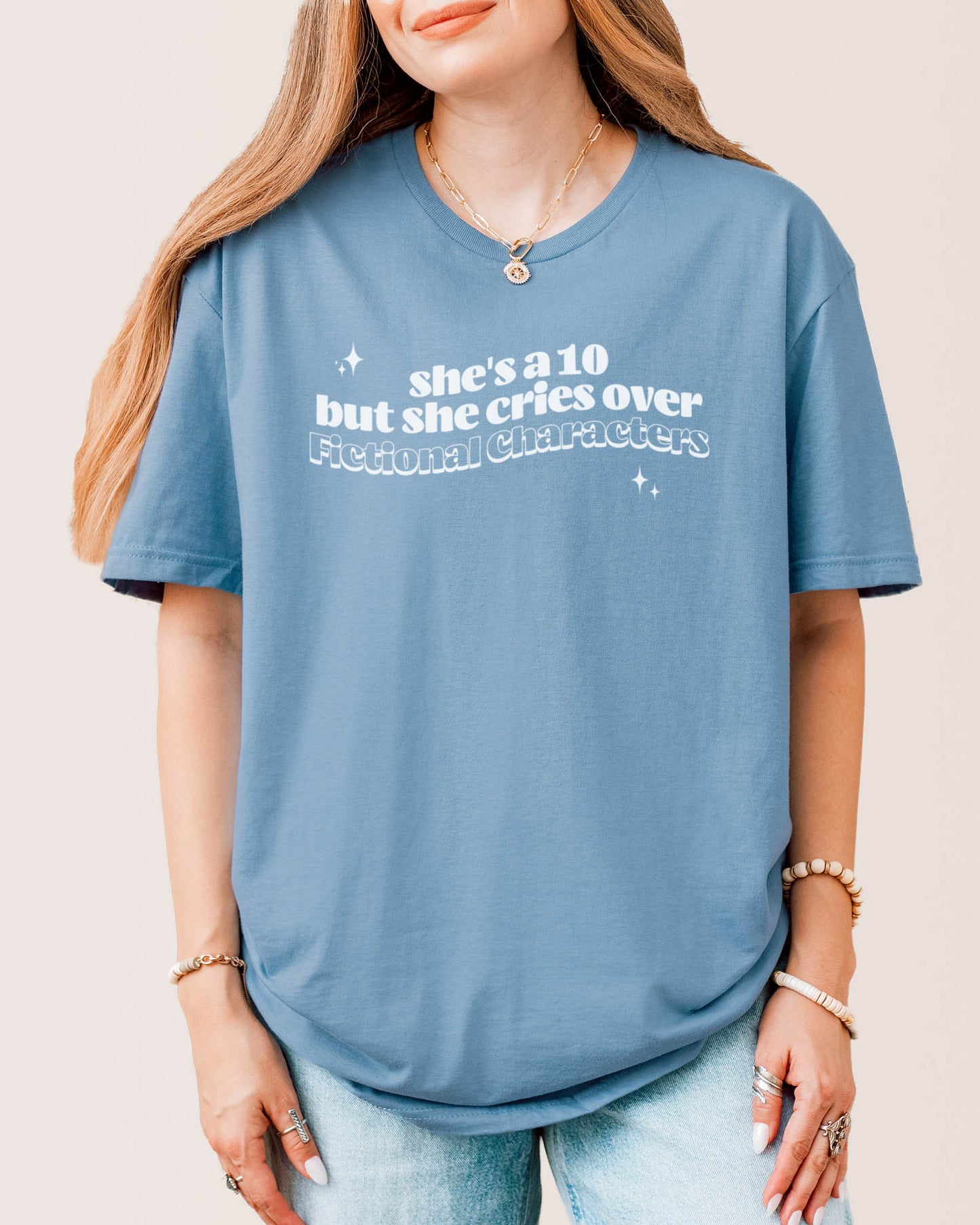 She's A 10 But She Cries Over Fictional Characters T‑Shirt Stone Blue